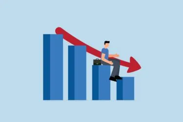 Economic,Recession,,Business,Owner,Seated,On,A,Falling,Down,Bar